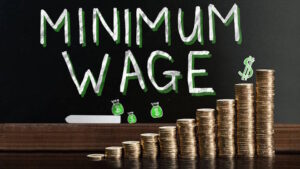 After a year of high minimum wages, a new report shows workers are working less and earning less in Washington State. 